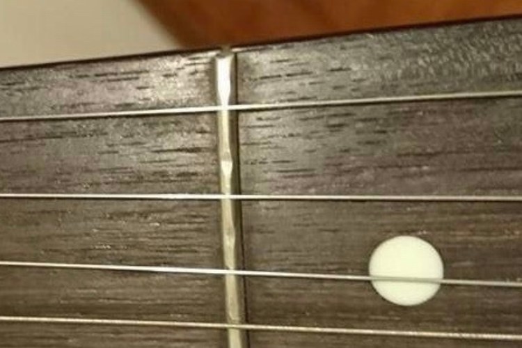 worn frets on freeboard