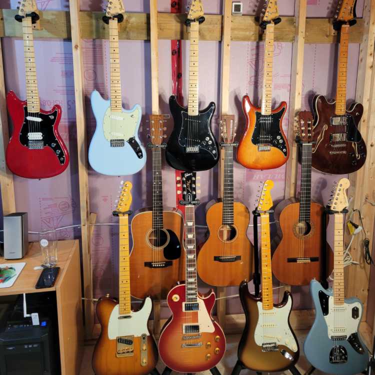 room full of guitars